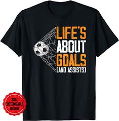 a black shirt with the words life's about goals and an image of a soccer goal