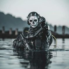 a man in scuba gear is floating in the water