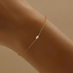 Elevate your style with this 925 sterling silver marquise-cut zirconia bracelet. Minimalist, timeless, and versatile, it's perfect for layering or solo wear. Ideal for gifting or adding chic elegance to any outfit. Minimalistic Bracelet, Delicate Gold Bracelet, Zirconia Bracelet, Minimal Bracelet, Simple Silver Jewelry, Bags Making, Dainty Gold Bracelet, Elegant Jewellery, Delicate Necklaces