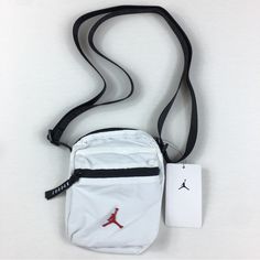 Brand New With Tags Jordan Jumpman Waist Bag Fanny Pack Belt Festival Pouch Crossbody White New White Rectangular Pouch With Adjustable Strap, White Sporty Crossbody Bag, Sporty White Crossbody Bags, White Pouch Chest Bag With Removable Pouch, White Pouch Bag With Zipper, White Crossbody Pouch For Daily Use, White Pouch Shoulder Bag With Zipper Closure, Sporty White Bag With Pockets, Casual White Pouch Chest Bag