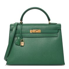 This is an authentic HERMES Courchevel Kelly Sellier 32 in Vert Bengale. This stylish tote is crafted of beautiful grained calfskin leather in green. The bag features a reinforced leather top handle, an optional shoulder strap, and strap closure with polished gold plated hardware. The front flap opens to a matching leather interior with zipper and patch pockets. Kelly Sellier, Leather Interior, Leather Top, Patch Pocket, Top Handle, Calf Skin, The Bag, Gold Plate, Shoulder Strap