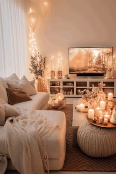 a living room filled with furniture and candles