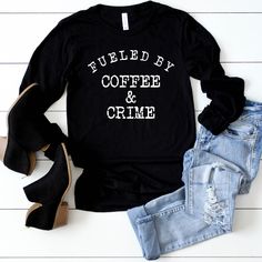 Fueled By Coffee And Crime Long Sleeve Tee, Crime Junkie Life Rule Shirt! Murderinos, Crime Junkies, True Crime Lovers rock this shirt! This classic unisex long sleeve tee fits like a well-loved favorite. Casually elegant, with an excellent quality print it is an irreplaceable everyday item. *Check size chart in photos for best fit!* .: Retail Fit .: 100% Soft cotton (fibre content may vary for different colors) .: Light fabric (4.2 oz/yd² (142 g/m .: Tear away label .: Runs true to size ☠ PRODU Long Sleeve Slogan Shirt In Relaxed Fit, Relaxed Fit Coffee Color Tops For Fall, Coffee Long Sleeve T-shirt With Letter Print, Coffee Color Long Sleeve Graphic T-shirt, Coffee Color Long Sleeve T-shirt With Graphic Print, Coffee Letter Print Tops For Fall, Coffee Colored Tops With Letter Print For Fall, Casual Long Sleeve Coffee T-shirt, Coffee Long Sleeve T-shirt With Graphic Print