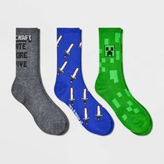 They'll love taking on their day in comfort and cool style with this 3-Pack of Minecraft Crew Socks. Made from a softy, comfy fabric suitable for year-round wear, these printed crew socks are also designed with spandex for stretchy comfort. The pack includes three pairs, each in a different color and featuring a different Minecraft game print or logotype that fans of the game will love. Novelty Cotton Socks For Winter, Novelty Cotton Winter Socks, Winter Novelty Cotton Socks, Multicolor Casual School Socks, Casual Multicolor School Socks, Casual Winter Socks For School, Boys Socks, Kids Clothes Boys, Teenage Boys