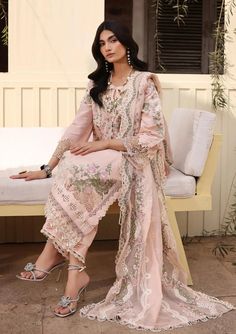 Brand: KAHFProduct Code: KFL-09B NORACollection: Kahf Festive Lawn Unstitched Spring Summer CollectionFabric: Lawn DESIGN DETAILS: Embroidered Lawn Front Panel 1-Piece Embroidered Lawn Back 0.76-Meter Embroidered Lawn Sleeves 1-Pair Solid Dyed Lawn Front Side Panel 0.25-Meter Embroidered Organza Front & Back Daman Border 1.6-Meter Embroidered Organza Front Daman Border 1-Piece Embroidered Organza Sleeves Border 1-Meter Embroidered Organza Trouser Border 1.10-Meter Embroidered Cotton Net Dupatta 2.5-Meters Solid Dyed Cambric Trouser 2.5-Meters DISCLAIMER:* Lining, Laces, and Tassels are not included in unstitched variants.* Embellishment items in stitched outfits are subject to market availability.* The actual colors of the outfit may vary from the colors being displayed on your device. CAR Luxury Festive Unstitched Cambric Suit, Luxury Embroidered Border Lawn Suit For Spring, Luxury Cambric Dupatta For Spring, Luxury Organza Lawn Suit For Spring, Luxury Festive Cambric Unstitched Suit, Luxury Embroidered Suits For Spring, Luxury Embroidered Unstitched Suit For Festivals, Luxury Women's Festive Lawn Suit, Luxury Festive Women's Lawn Suit