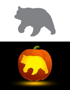 a bear carved into a pumpkin with the shape of a bear on it's side