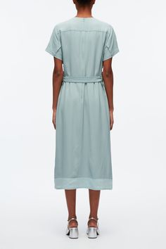 Fitted Daywear Dress With Belted Cuffs, Fitted Dresses With Belted Cuffs For Daywear, Fitted Dress With Belted Cuffs, Spring Belted Dress With Tie Fastening For Daywear, Summer Belted Dress With Fitted Waist, Spring Dresses With Tie Fastening For Daywear, Spring Dress With Self Belt For Work, Spring Workwear Dress With Self Belt, Belted V-neck Daywear Dresses