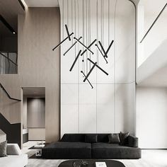 a modern living room with black and white furniture