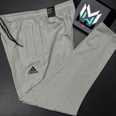 Adidas Aeroready Game And Go Tapered Pants Men’s Sizes Grey Heather Hl2179 Measurements Medium Waist: 30 Inches Inseam: 29.5 Inches Length: 39.5 Inches Large Waist: 33 Inches Inseam: 29.5 Inches Length: 40 Inches Xl Waist: 35 Inches Inseam: 28.5 Inches Length: 39.5 Inches 2xl Waist: 38 Inches Inseam: 28.5 Inches Length: 40 Inches Adidas Gray Sports Pants, Adidas Sports Pants In Gray, Adidas Casual Tapered Leg Pants, Tapered Pants Men, Pants Adidas, Tapered Pants, Adidas Pants, Grey Adidas, Pants Men