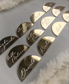 six gold and white name tags with the word bride written on them