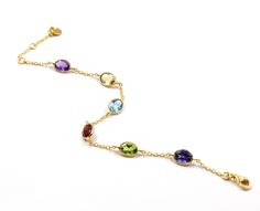 Multi Gemstone Bezel Bracelet,Mulit Color Bracelet,Handmade Bracelet,Statement Bracelet,Solid 925 Sterling Silver Jewelry,Birthday Gift SKU -ETB1029 Style - Bracelet (An30) Gemstone - Blue Topaz , Citrine,Amethyst,Iolite ,Garnet,Peridot Metal - 92.5 % Solid Sterling Silver Weight- 2.6g Approx Length:-7 Inch Stone Shape-Oval Stone Cut - Faceted Stone Size-7x5mm Multi-stone Bracelets For Gift, Gold Multi-stone Bracelets For Gifts, Multi-stone Round Bracelets As Gifts, Elegant Multicolor Bracelets For Birthday, Bezel Bracelet, Silver Handmade Jewelry, Color Bracelet, Adjustable Jewelry, Sterling Silver Jewelry Handmade