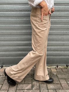 Amazing Creamy Chestnut Wool Flared Bootcut Trousers from the 70s still completely new after 50 years.  Made in Italy and produced between 1971-1976. The original manufacturer doesn't exist anymore.  Done with fine wool mixed with polyester. Amazing bell-bottoms fit, high-waisted, exactly like it supposed to be. Please refer to the measurements to guarantee a seamless buying experience. Size 50IT Shop opening! FREE delivery for our first customers!   Measurements: Waist 41.5 cm  Total length 106 Bootcut Trousers, Flared Trousers, Flare Trousers, 50 Years