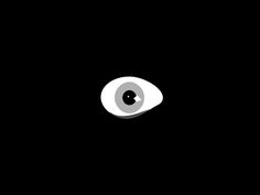 an eye is shown in the dark with only one eye visible for all to see