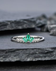 Dainty emerald and moissanite wedding band, fit for high profile wedding ring or wear as an decoration for your pinky finger or index finger. ★Description *Accent stone: 4X2mm Marquise Cut Emerald, 3X1.5mm Baguette Cut Emerald *Side Stone: 0.05 Carat 0.9mm Round Cut Moissanite *Band Width(Bottom): Approx. 1.5mm ★Procedure information Please select the material and ring size from the drop-down menu on the right side of the listing. If you have any special requests or questions, please do not hesi Cluster Wedding Band, Pinky Finger, Ring Enhancer, Moissanite Band, Baguette Ring, Moissanite Wedding Bands, Matching Band, Baguette Cut, Marquise Cut