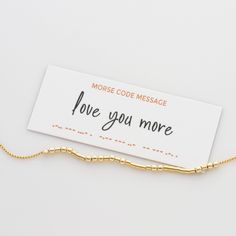 Our "Love You More"  Morse Code Bracelet features 14k gold filled or sterling silver beads encoded with a hidden message known only to you and those you share it with. This unique design makes for a perfect wife, sister, or girlfriend gift with each dainty bead and dash carrying a secret reminder of your special bond. As they wear the bracelet, they carry the message close to them, serving as a reminder of your love.  * listing is for ONE morse code bracelet  D E T A I L S * 100% 14K gold fill o Meaningful Gold Beaded Bracelets For Gifts, Meaningful Gold Beaded Bracelet For Gifts, Meaningful Gold Beaded Bracelets As Gift, Meaningful Gold Beaded Bracelet As Gift, Gold Beaded Bracelets For Valentine's Day Anniversary, Meaningful Gold Name Bracelet For Mother's Day, Gold Name Bracelet For Mother's Day, Gold Jewelry With Message Card For Mother's Day, Gold Beaded Bracelets For Wedding And Valentine's Day