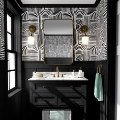 a black and white bathroom with gold accents