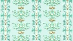 a blue and white wallpaper with ornate designs