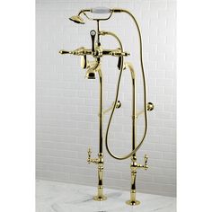 a gold shower faucet with two handset spout and hand shower head