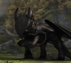 an animated image of a dragon with wings