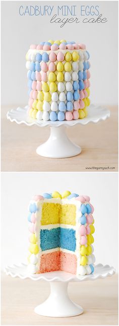 the cake is decorated with pastel colors and marshmallows