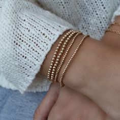 Easy to take on & off, perfect for effortless added style in no time. 14k gold filled beads. Available in tiny (2mm beads), medium (3mm beads), large (4mm beads), and extra large (5mm) beads. Measures 6.5 inches, if you have larger wrists, email us to place a custom order. Hair Cuffs, Chain Anklet, Beaded Stretch Bracelet, No Time, Stretch Bracelet, Ring Bracelet, On Off, Stretch Bracelets, Wrap Bracelet