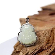 Design Concept--- This jade necklace depicts a buddha. Also known as the "enlightened one". Founder of Buddhism who later became known as “the Buddha,” lived during the 5th century B.C. His teachings are deep and once a person has allowed themselves to learn those teaching, it is common for them to bring those concepts into every aspect of their life. A pendant with Buddha is common so that they have the blessings with them no matter where they are. The term Buddha literally means enlightened on Jade Amulet Jewelry For Meditation, Buddha Pendant Necklace, Classic Bangles, Laughing Buddha, Buddha Pendant, White Gold Sapphire, Jade Necklace, White Jade, Jade Jewelry