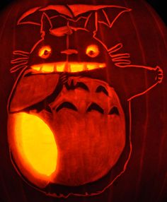 a pumpkin carved to look like a cat