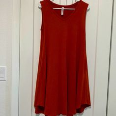 New Without Tags Super Soft Swing Dress Sleeveless With Pockets Deep Burnt Orange In Color Rounded V Neck Stretchy, Flowy 55% Poly, 40% Rayon, 5% Spandex #A-5 Casual Red Sleeveless Mini Dress, Casual Red Stretch Sleeveless Dress, Casual Red Sleeveless Stretch Dress, Stretch Sleeveless Sundress, Casual Stretch Sundress With V-neck, Casual V-neck Stretch Sundress, Premium Colors, Trapeze Dress, Dress With Pockets