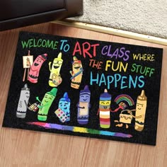 a welcome mat with the words, art class where the fun stuff happens on it