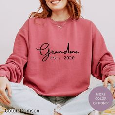 Grandma Sweatshirt is perfect for any occasion. All our sweatshirts are made with the highest quality materials and are super soft and cozy! - Sweatshirt information and material - Our Comfort colors sweatshirts have a vintage look. It's made with 80% ring-spun cotton and 20% polyester (Medium-heavy fabric) and the fabric is 3-end garment-dyed, ring-spun, color-blast fleece with a 100% cotton face. Each sweatshirt comes with a relaxed fit, a rolled-forward shoulder, and a back neck patch.  Color may vary slightly due to individual monitors.  - How to order - 1. Check our sizing chart.  2. Select your size and color from the drop-down menu.  - Care instructions - Turn the sweatshirt inside out and wash with cold water (max 30C or 90F). It is also recommended to air dry or dried on low heat Personalized Name Print Sweatshirt As Gift, Personalized Name Print Long Sleeve Sweatshirt, Personalized Long Sleeve Sweatshirt As Gift, Long Sleeve Sweatshirt With Name Print As Gift, Pink Long Sleeve Sweatshirt With Name Print, Pink Crew Neck Sweatshirt For Mother's Day, Relaxed Fit Long Sleeve Sweatshirt For Gift, Relaxed Fit Long Sleeve Sweatshirt As Gift, Pink Relaxed Fit Sweatshirt As Gift