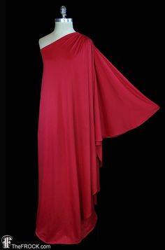 "BIG NEWS After 22 years, our website, TheFROCK.com, has had a makeover. Check out the new site, and join our mailing list for new arrivals.  Vintage 1970s or early 80s Halston single-sleeve grecian goddess toga dress. The underdress's bust stretches from 32\"-40\", waist stretches from 26-34\", the gown length is 61\", and the knuckle length sleeve is about 26\". Condition is excellent, a rare and incredibly stylish sleeved version of his iconic toga.  Layaway is available. ALL DELIVERY DATES m 80s Couture, Halston Vintage, One Shoulder Drape Dress, Toga Dress, Red Drapes, Gown Red, Grecian Goddess, Draped Dress, Evening Gowns Formal