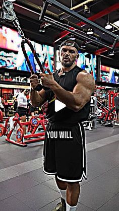 a man is doing exercises in the gym