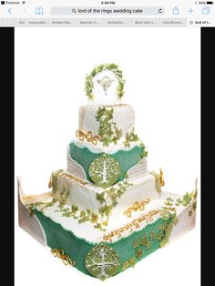 a three tiered cake decorated with green and white decorations