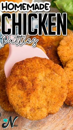 homemade chicken patties on a cutting board with lettuce in the background