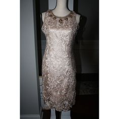 Beautiful Gold Lace Sheath Dress By Boston Proper. This Knee Length Dress Is All Lace And Is Fully Lined. The Dress Lining Has Adjustable Lingerie Style Straps For A Perfect Fit. Back Zipper With Hook And Eye At The Back Neck. Rhinestone Trim Goes All The Way Around The Neckline. Measurements As Follows: Length: 35.5" At Center Back Bust: 34" Waist: 29" Lace Is 100% Polyester. Lining Is Poly/Spandex. Dry Clean Only. New With Tag Please Email Me With Any Questions. Items Ship Within 2 Days Of Pay Elegant Stretch Dress With Rhinestones, Elegant Spring Dresses With Rhinestones, Elegant Lace Dress With Rhinestones, Evening Lace Dresses With Rhinestones, Boston Proper Dresses, Dress Lining, Rhinestone Trim, Boston Proper, Lace Sheath Dress