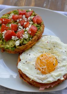 an egg and avocado toast on a plate