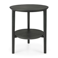 a black table with a round wooden top