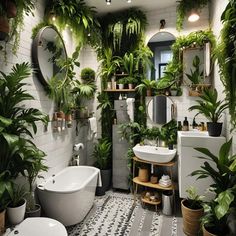 a bathroom filled with lots of potted plants next to a bathtub and sink