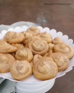 low carb meringues with cocoa swirl on a white plate, ready to be eaten