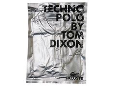 a white towel with the words tech polo by tom dixon printed on it