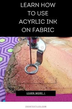 a pair of scissors that are on top of fabric with the words learn how to use acrylic ink on fabric