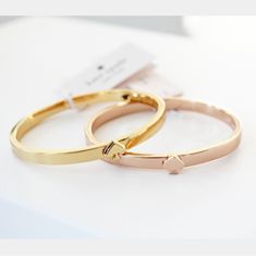 Firm Price Brand New With Tag. Kate Spade Dust Bag Is Included. Gold-Plated Metal With Cubic Zirconia Press The Right Side Of Spade To Open The Bracelet. Weight: 24.2g Inner Circumference: 60mm X 53mm Style # Wbruh260 Np#J98 Metal Bracelet, Spade Jewelry, Kate Spade Jewelry, Metal Bracelets, Womens Jewelry Bracelets, Right Side, Cubic Zirconia, Kate Spade, Dust Bag