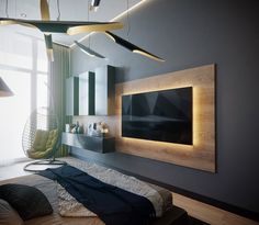 a bedroom with a large television mounted on the wall and hanging lights in front of it