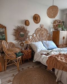 a bed room with a neatly made bed and lots of wicker decorations on the wall