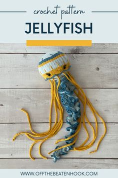 the crochet pattern jellyfish is shown on a wooden background with text overlay