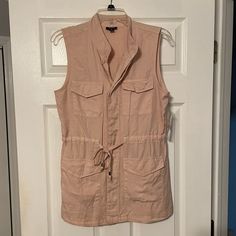 Nwt A.N.A. Sleeveless Cargo Shirt. Rose Smoke In Color. Drawstring Belted Waistband With Silver Accents On Lace. 4 Front Cargo Pockets. Hidden Button Front Closure. 100% Lycocell Material. Size X Small. Casual Sleeveless Tops With Pockets, Spring Sleeveless Blouse Tank Top With Pockets, Spring Sleeveless Blouse With Pockets, Pink Sleeveless Vest With Pockets, Cargo Shirts, Silver Accents, Shirt Color, Colorful Shirts, Button Down Shirt