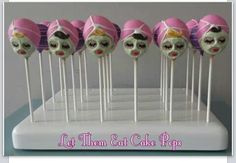 there are many cake pops with faces on them