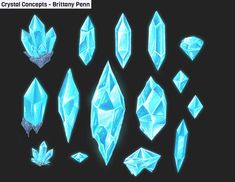 several blue crystals are shown on a black background