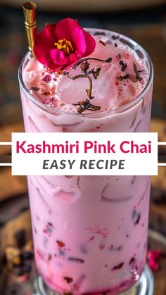 the pink chai is served in a tall glass with ice and garnish