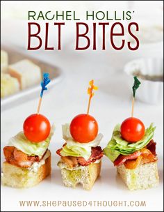 three small sandwiches with tomatoes and lettuce on them